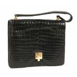 A Hermes vintage black crocodile skin handbag