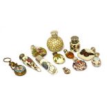 Twelve assorted miniature ceramic scent bottles,