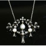 A pearl and diamond pendant,