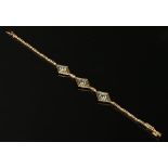 An Art Deco gold and platinum aquamarine bracelet,