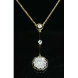 A gold diamond set Edna May pendant, c.1915,