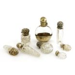 Eight assorted silver and cut glass scent bottles,