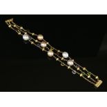 An 18ct gold three row 'Paradise' gemstone and cultured freshwater pearl bracelet