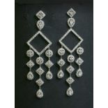 A pair of white gold diamond set girandole drop earrings,