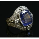 A Czechoslovakian gold and platinum sapphire and diamond cluster ring,