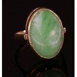 A 9ct gold single stone jade ring