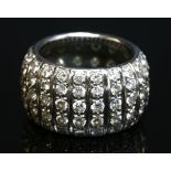 A white gold diamond set 'D' section band ring