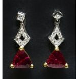 A pair of 18ct yellow and white gold rhodolite diamond drop earrings,