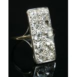 An Art Deco white gold diamond set fingerline plaque ring