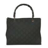 A Gucci black fabric monogrammed shopper,