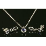 A white gold sapphire and diamond cluster pendant necklace and earring suite