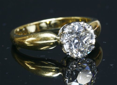 An 18ct gold single stone diamond ring,