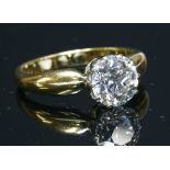 An 18ct gold single stone diamond ring,