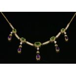 A cased Edwardian gold, peridot, amethyst and seed pearl necklace,