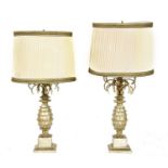 A pair of silvered wood and pineapple table lamps,