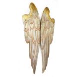 A pair of carved wooden painted and gilt angel wings,