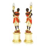 A pair of blackamoor floor lamps,