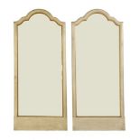 A pair of painted and gilt wall mirrors