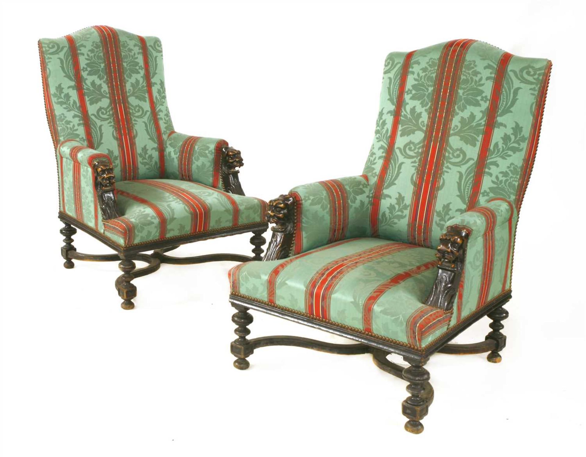 A pair of Victorian walnut library armchairs