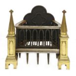 A Gothic-style fire grate and andirons,