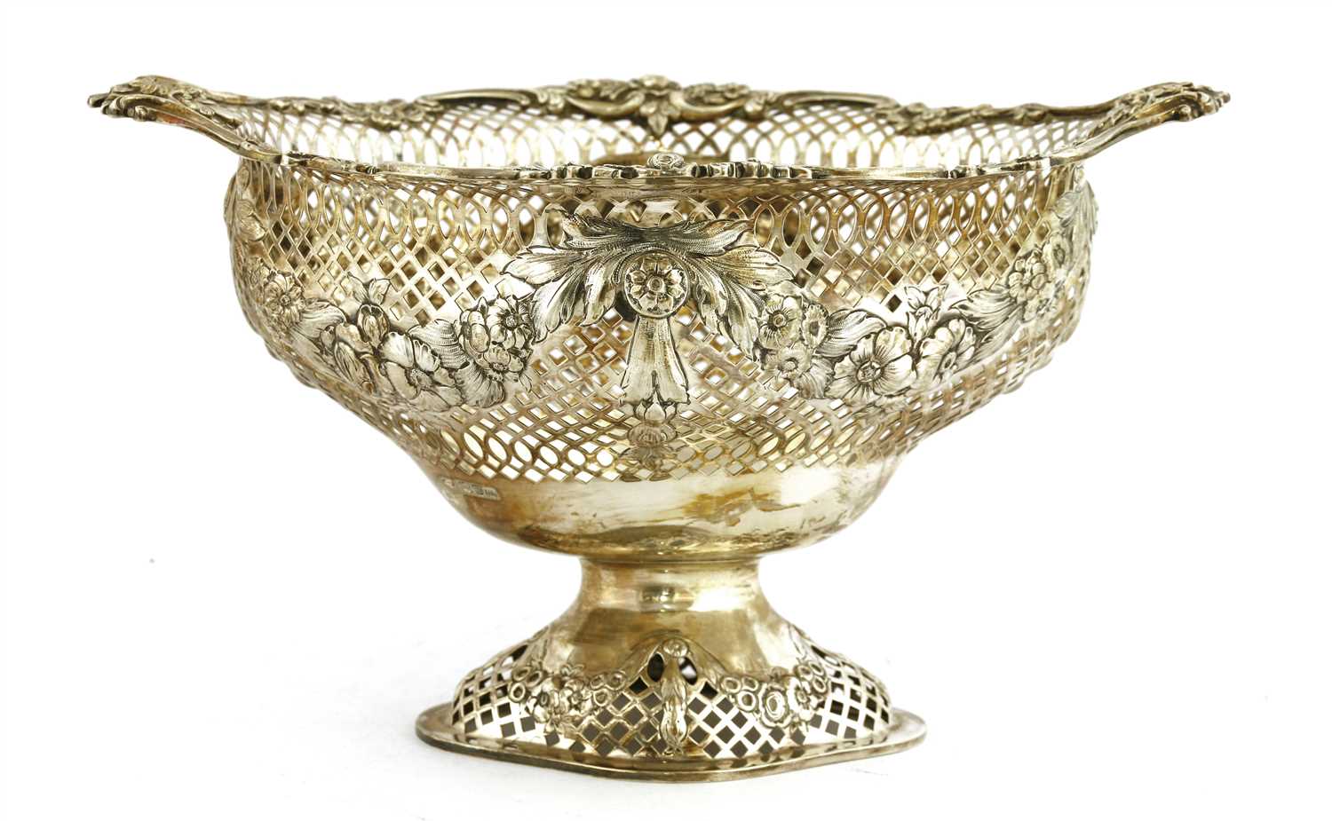 A pierced silver pedestal basket,