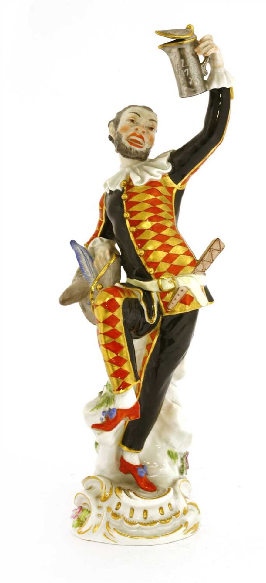 A Meissen figure of an harlequin,