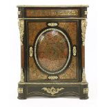 An ebonised boullework and brass-mounted cabinet,