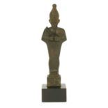 An Egyptian bronze figure of Osiris