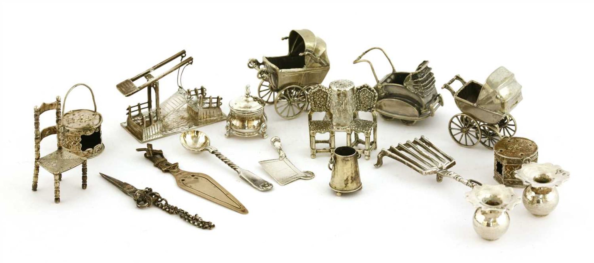 A collection of silver miniatures,