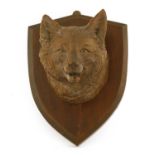 A Black Forest carved wooden fox mask,