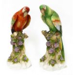 A pair of large German porcelain parrots