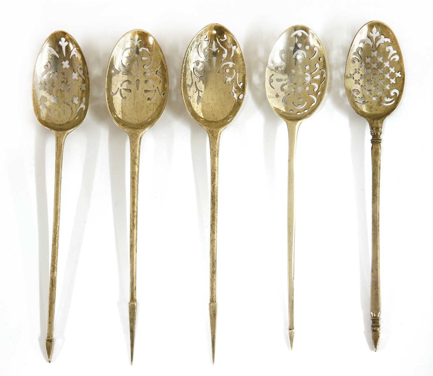 Five silver mote spoons