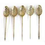 Five silver mote spoons