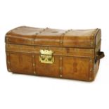 A leather and brass-studded trunk,