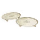 A pair of oval silver salvers