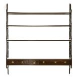 A George III mahogany four-tier open wall shelf,