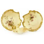 A pair of Royal Worcester blush ivory cabinet plates