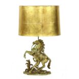 A brass table lamp in the form of a Marly horse,