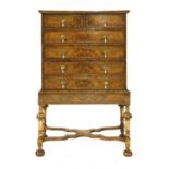 A walnut chest on stand,