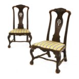 A pair of Dutch walnut low chairs
