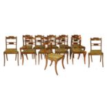 A set of twelve Regency rosewood dining chairs,