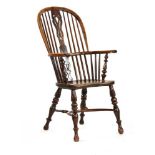 A yew wood and elm high back Windsor chair,