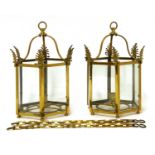 A pair of Regency-style brass hall lanterns