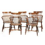 An harlequin set of five early Victorian yew wood and elm Windsor chairs,