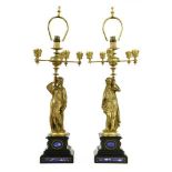 A pair of gilt bronze figural candelabra