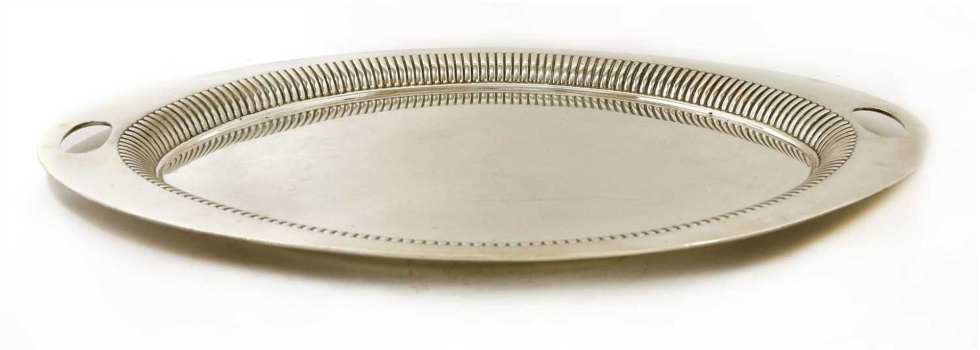 An oval silver tray,