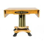 A Biedermeier satinwood and ebonised sofa table