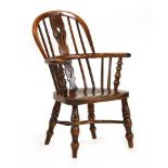 A yew wood and elm child's Windsor chair