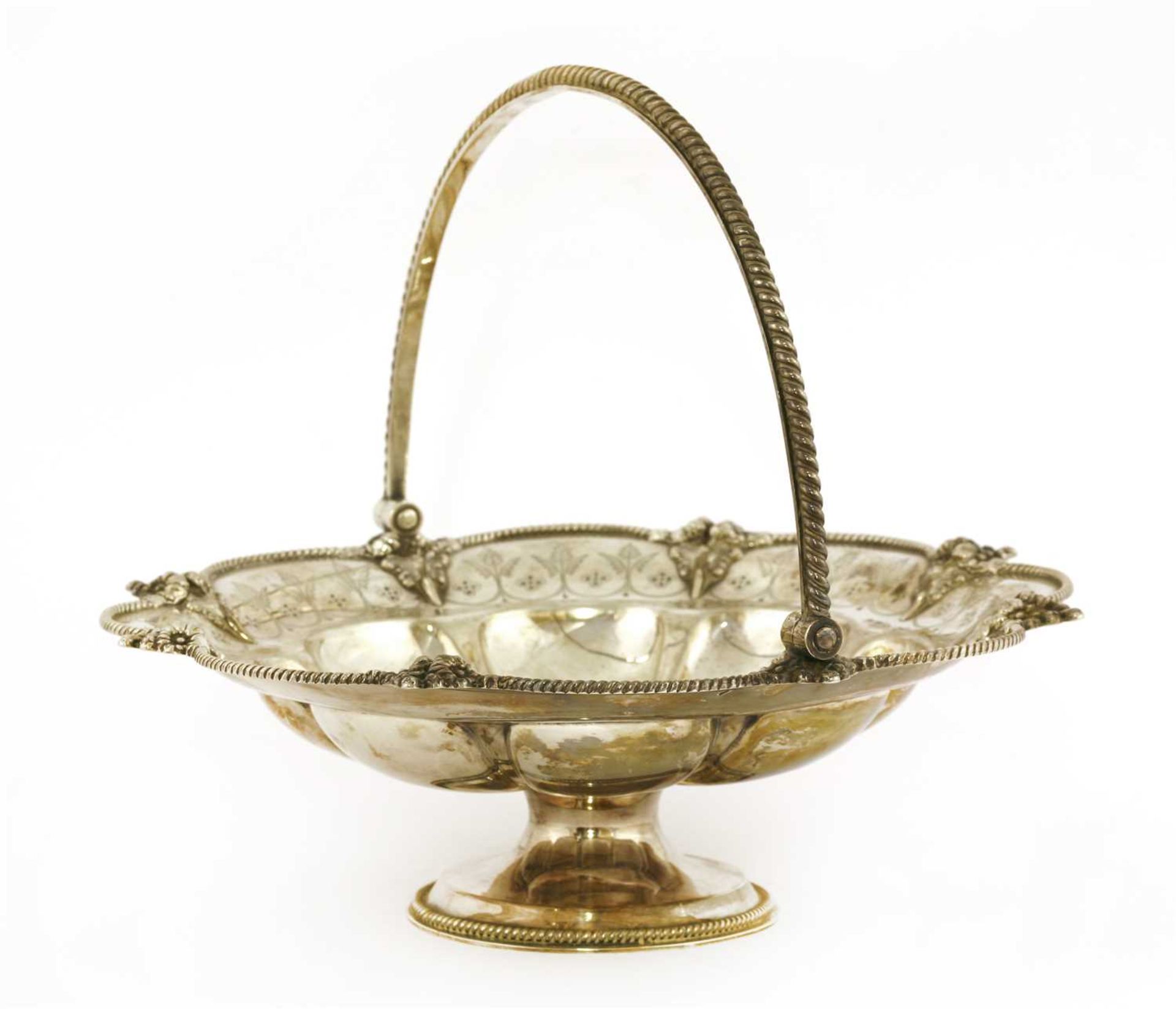 A Victorian swing-handled silver cake basket,