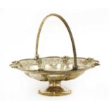A Victorian swing-handled silver cake basket,